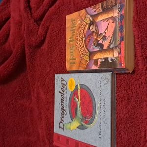 The Dragonology Handbook & Harry Potter and the sorcerers stone.